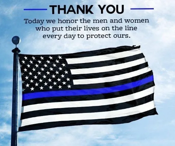 A thin blue line flag displayed in honor of law enforcement officers.